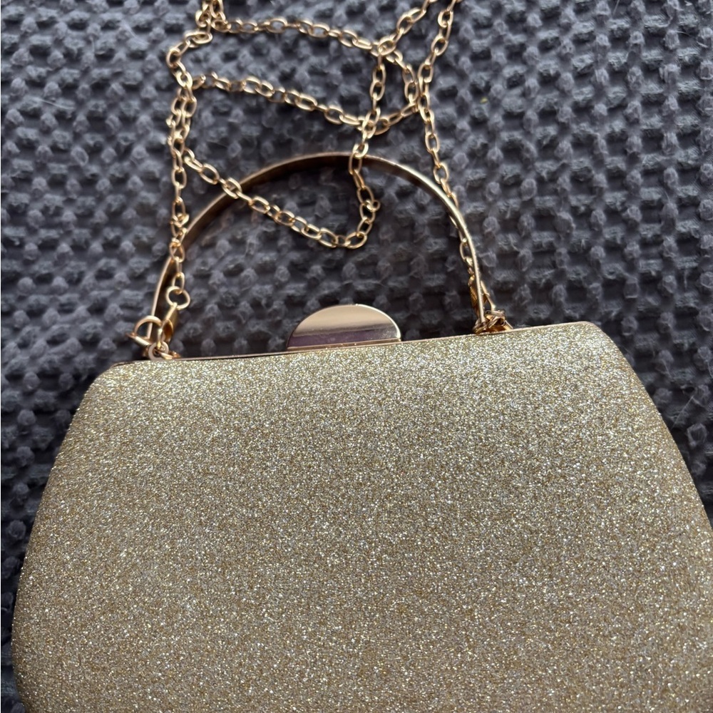 The Leaur Clutch bag gold with shoulder chain or handle by Haute Sauce